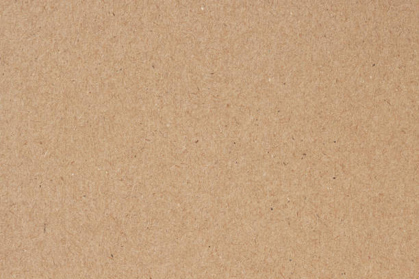 istock Organic cardboard texture background close-up. Recyclable material 1383036693