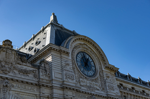 One of the clocks on the outside of the D'Orsay museum. This is on the left bank of the Seine, Paris, France.
