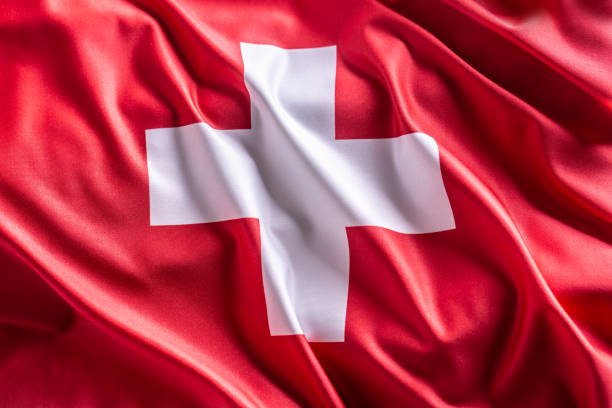 Waving flag of Switzerland. National symbol of country and state. stock photo