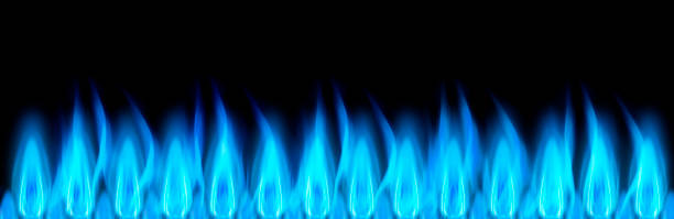 istock Blue gas flames against a dark background 1383039253