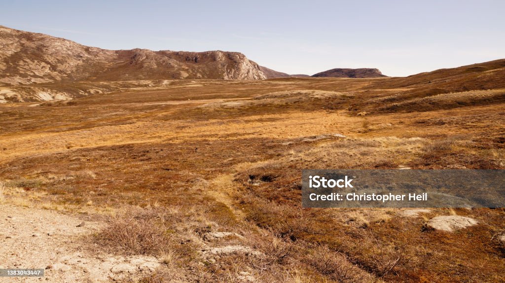 Arctic Circle Trail lake and mountain landscapes between Kangerlussuaq and Siimiut in Greenland. Adventure Stock Photo