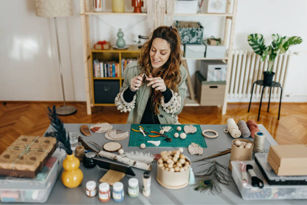 istock Young women making handmade jewelry at studio 1383045219