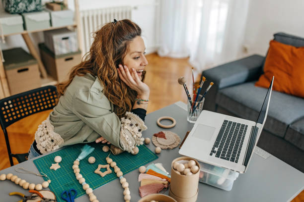 istock Young women small business owner using technology at the studio 1383045277