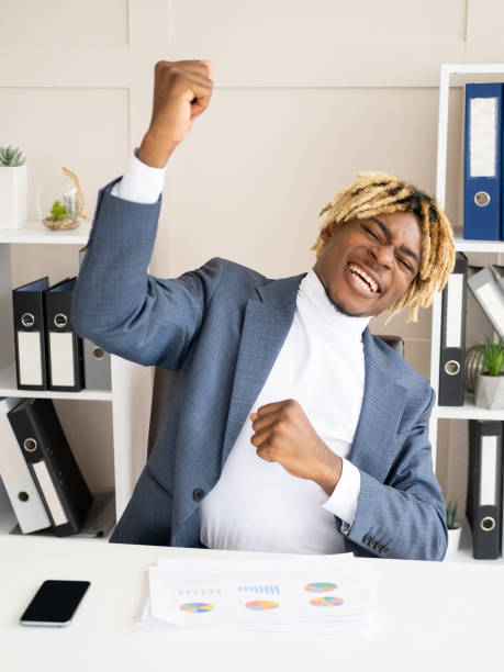 istock successful achievement excited black man good 1383045288