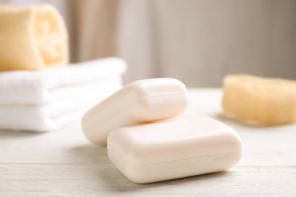 istock Soap bars on white wooden table indoors. Personal hygiene 1383050598