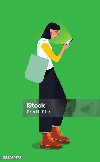 istock Fashion and beautiful girl  with empty shopping bag are watching mobil phone while walking 1383050678