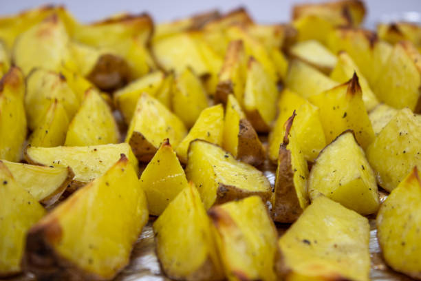 istock Baked potatoes with large pieces 1383051514