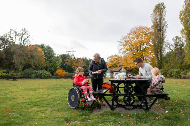istock Family Picnic In The Park 1383053307