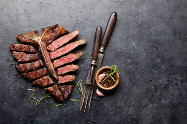 istock Grilled porterhouse beef steak. Sliced T-bone 1383053435
