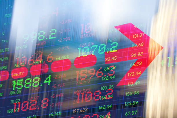 istock Finance. Graphic Arrow. Blurred Office Buildings and Trading Screen Data. 1383053663