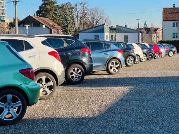 istock Row of parked cars 1383056156