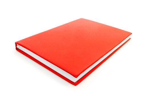 Red hardcover book isolated on white background.