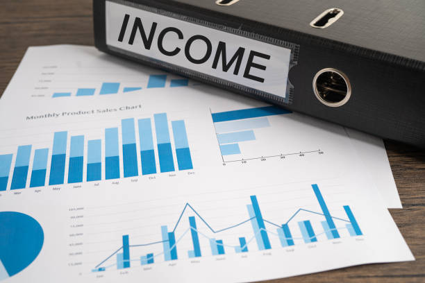 Income. Binder data finance report business with graph analysis in office. stock photo