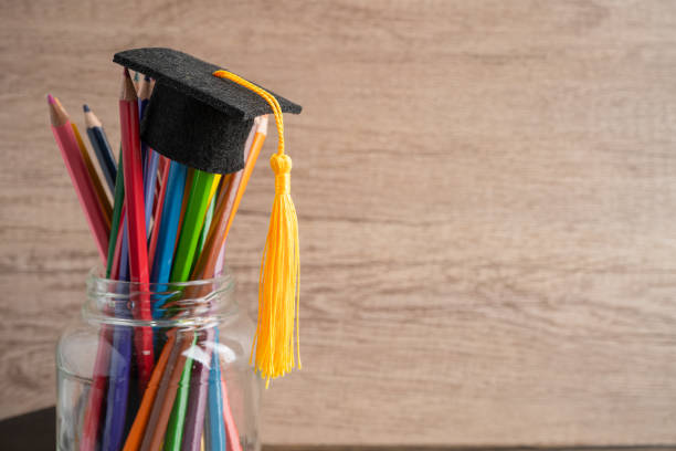 istock Graduation hat with colorful pencils with copy space, learning university education concept. 1383070095