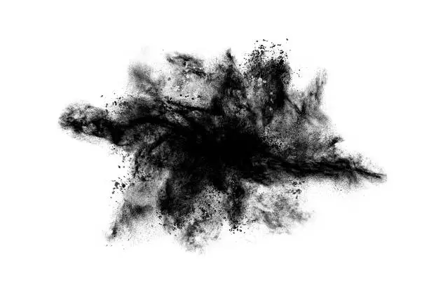 Abstract exploding gunpowder isolated on white background.
