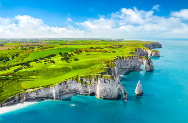 Picturesque panoramic landscape on the cliffs of Etretat. Natural amazing cliffs. Etretat, Normandy, France, La Manche or English Channel. France
