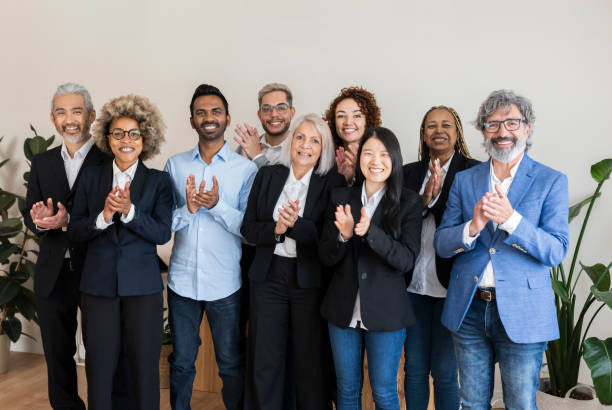 istock group of business people, different generations, different countries, applause 1383091943