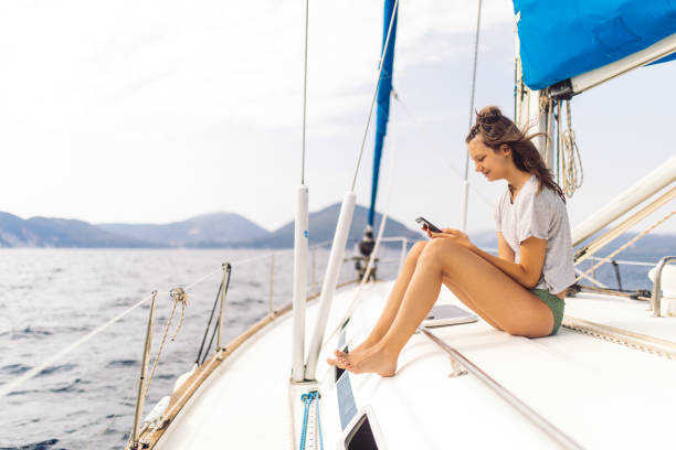 istock Girl enjoying on sailing 1383092548