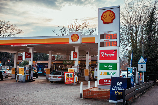 Crawley, UK - 8 March, 2022: forecourt of a Shell petrol station in Crawley, England. People are refueling their cars at a point where unleaded and diesel prices have reached record highs due to the Ukraine conflict.