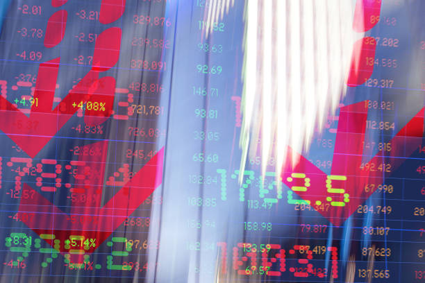 istock Finance. Graphic Arrow. Blurred office Buildings and Trading Screen Data. 1383095240