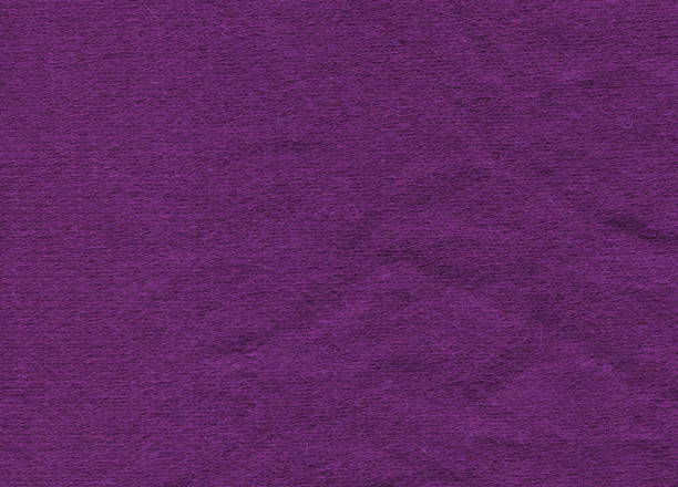 istock Lavender or plum colored  abstract woven knitwear textile background 1383096456