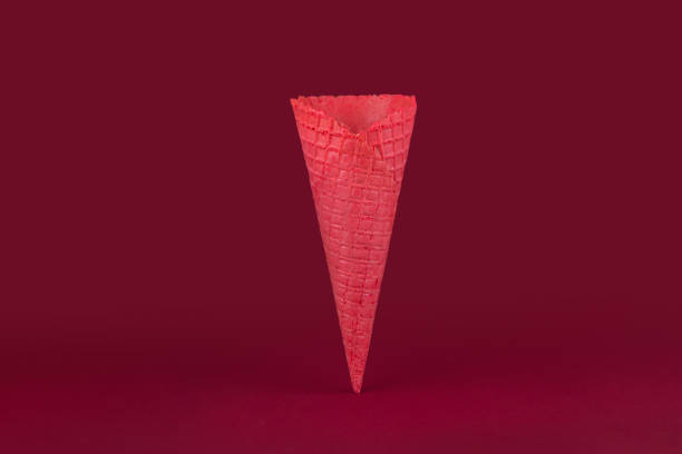 istock Empty waffle horn on red background, top view, minimalist trend. 1383097334