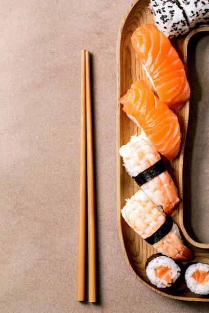istock Japanese dish sushi and rolls rice with fish 1383097901