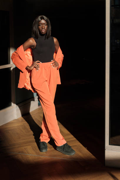 istock Black young model posing in a hotel lobby. 1383098927