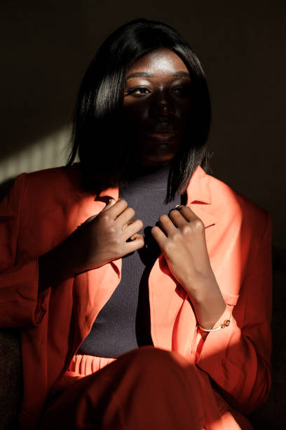 istock A black model is looking away in a moody environment. 1383098929