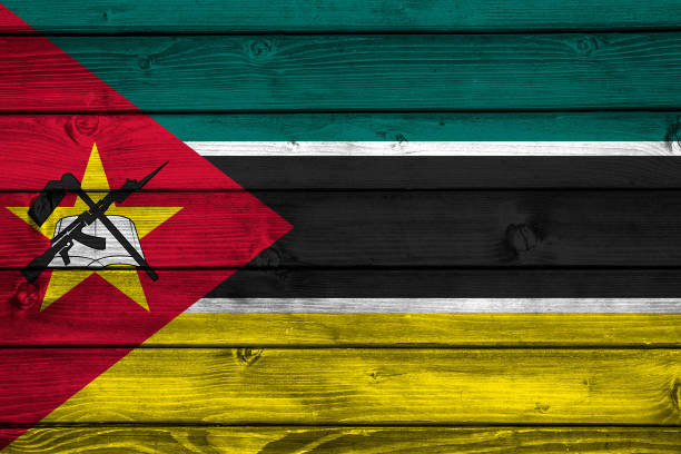 Flag of Mozambique on wooden surface