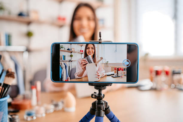 istock Woman unboxing in live video 1383100163