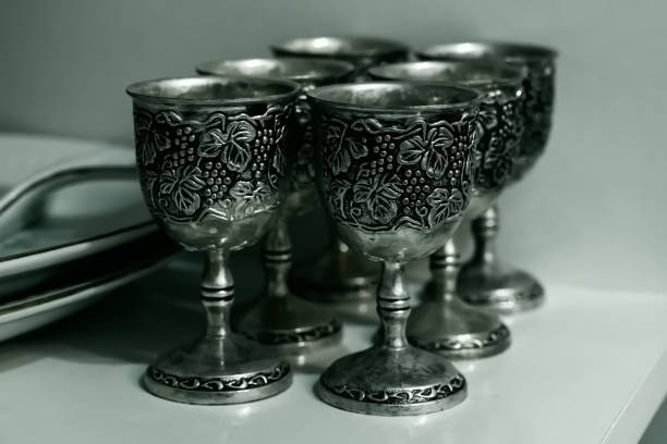 istock Antique Vintage Silver glasses made of different alternative compositions on a white background Macro Detail shot abstract pastel background images buying now. 1383103440