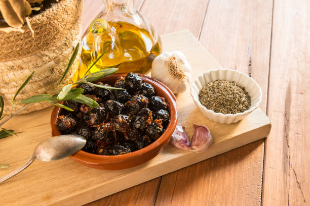 istock Still life with a bowl of olives. 1383107002