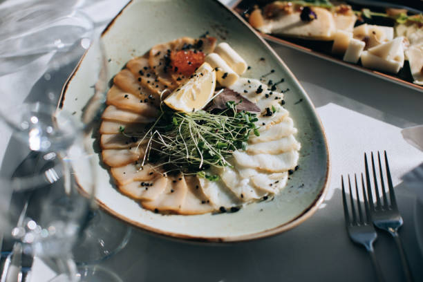 istock Fish dish on a plate at a wedding banquet in a restaurant 1383108904