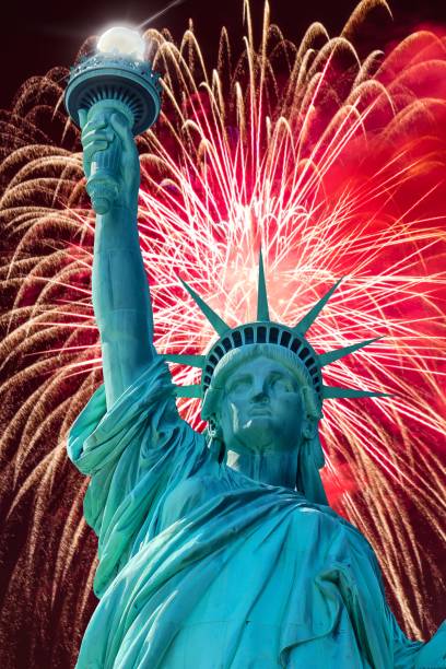 istock Statue of Liberty with fireworks 1383111699