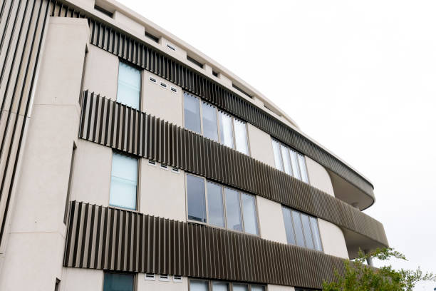 New modern apartment building, Sydney Australia, white background with copy space, full frame horizontal composition