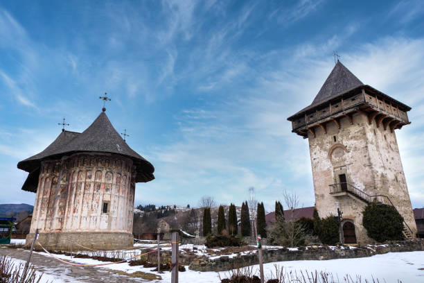 istock Landscape of two religious transilvanian romanian monasteries built in a rustic style 1383116160
