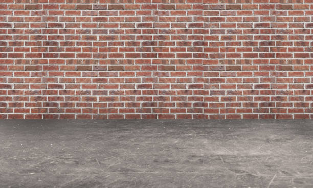 istock Empty room with brick wall and concrete floor 1383117757