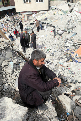 Van, Turkey - October 25: Earthquake victim Turkish man in front of his house for own family on October 25, 2011 in Van, Turkey. It is 604 killed and 4152 injured in Van Earthquake.