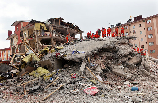 Van, Turkey - October 25: Rescue team is searching for the wounded under the debris aftter the earthquake on October 25, 2011 in Van, Turkey. It is 604 killed and 4152 injured in Van Earthquake.