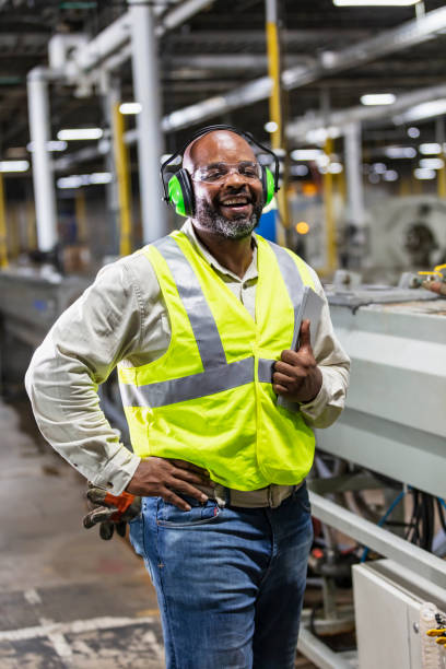 istock African-American man standing in plastics factory 1383124877