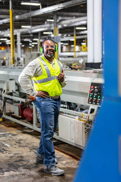 istock African-American man standing in plastics factory 1383124880