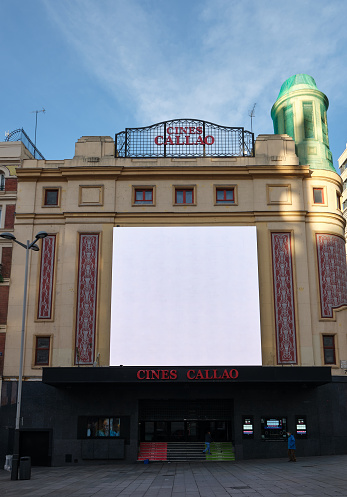 Madrid, Spain - JAN 01 2022: Cine Callao on deserted Callao square on New Year's day.