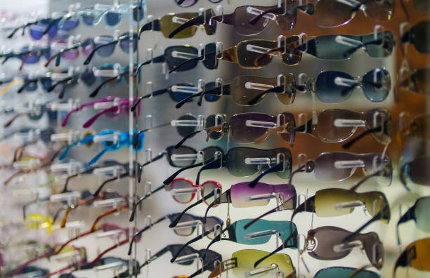 istock Large selection of multicolored sunglasses. 1383126529