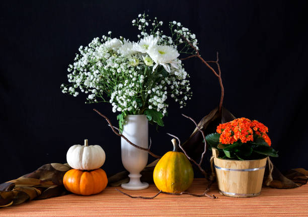 istock Still life with chrysanthemums and pumpkins 1383127686