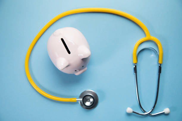 istock Piggy Bank and Stethoscope. 1383127797