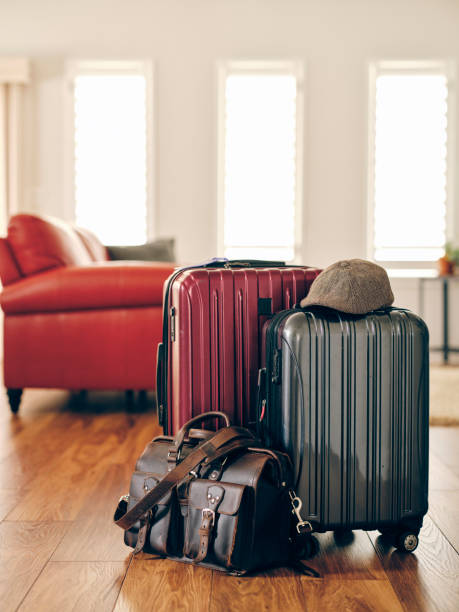 istock Suitcases in a Home Ready for Travel 1383127896