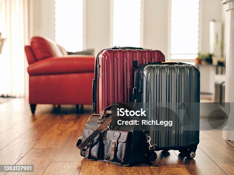 istock Suitcases in a Home Ready for Travel 1383127901