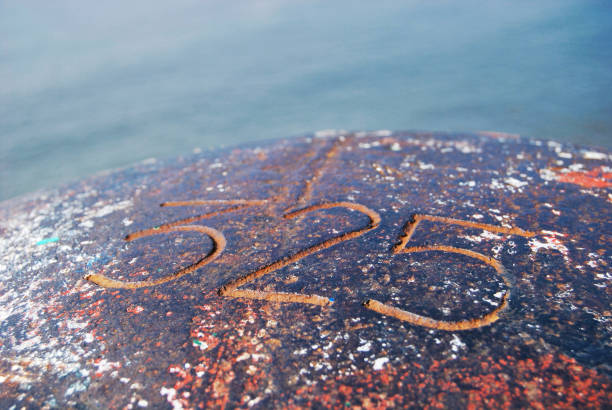 istock Rusty mooring pin with number 325 1383129674