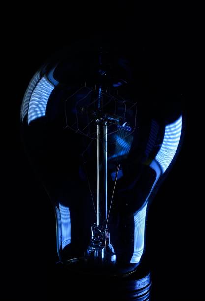 istock switched off halogen incandescent lamp close-up on a black background 1383130485